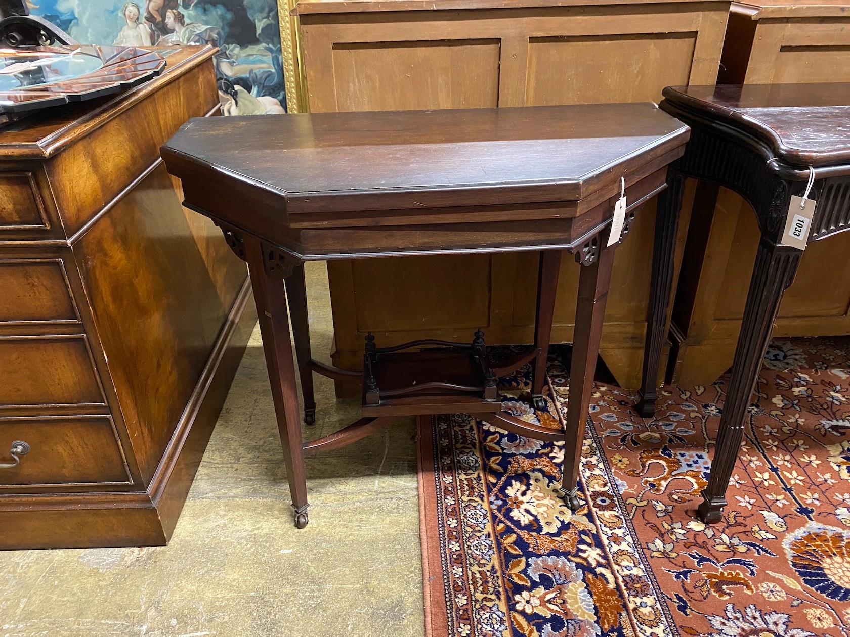 An Edwardian mahogany folding card table, width 86cm, depth 43cm, height 70cm